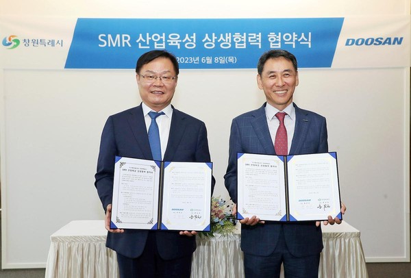 창원특례시와 두산에너빌리티가 ‘SMR 산업육성 상생협력’ 업무협약을 체결했다./사진=창원시